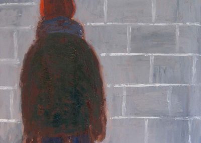 Against the wall
